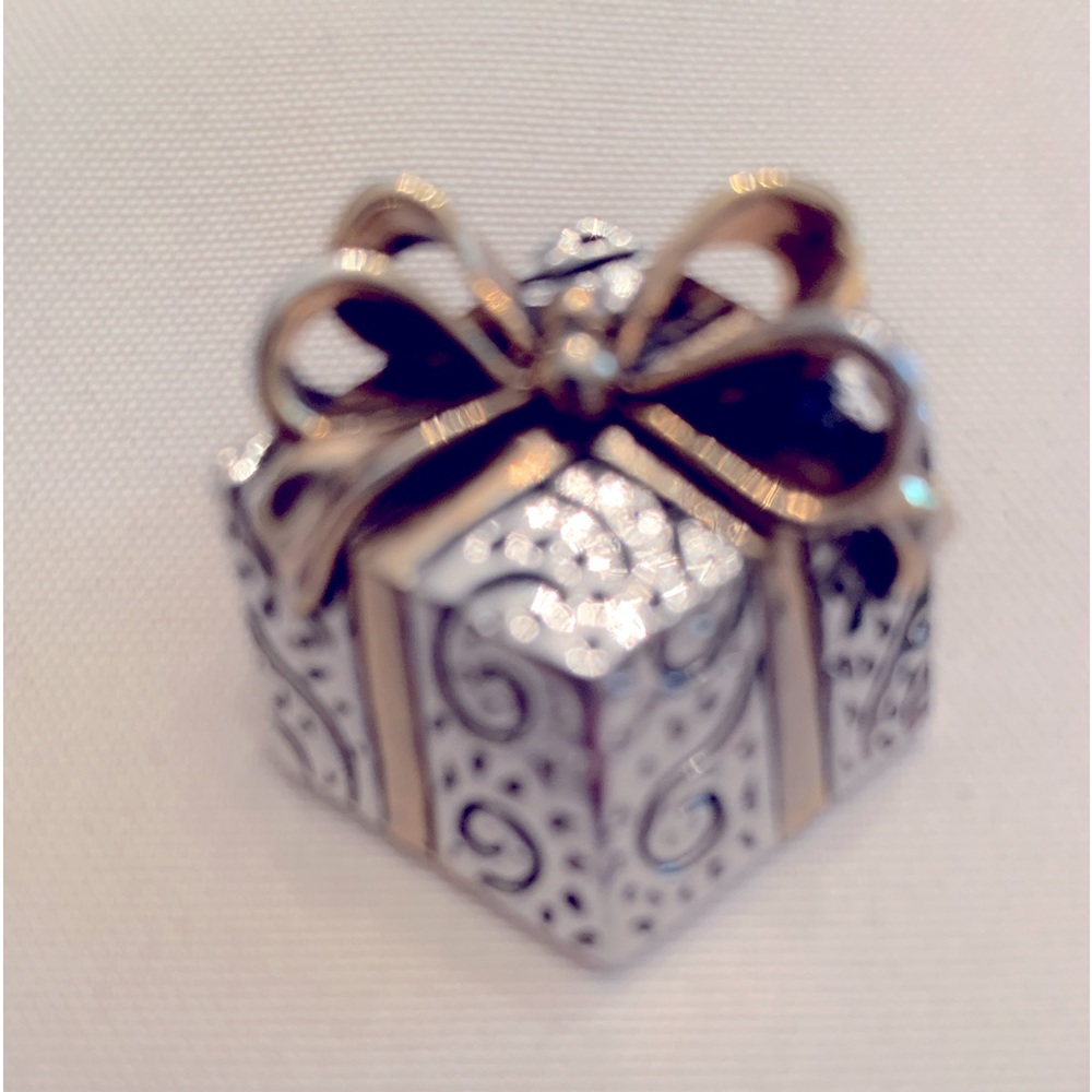 Perfectly detailed package necklace slide; pin/brooch. Shades of silver & gold.